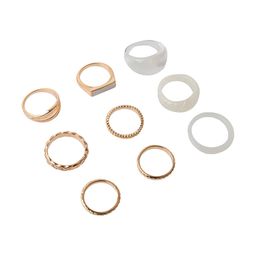 Set de Anillos Dorados Wav de Pasta y Piedra Blanca x 9 un