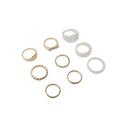 Set de Anillos Dorados Wav de Pasta y Piedra Blanca x 9 un